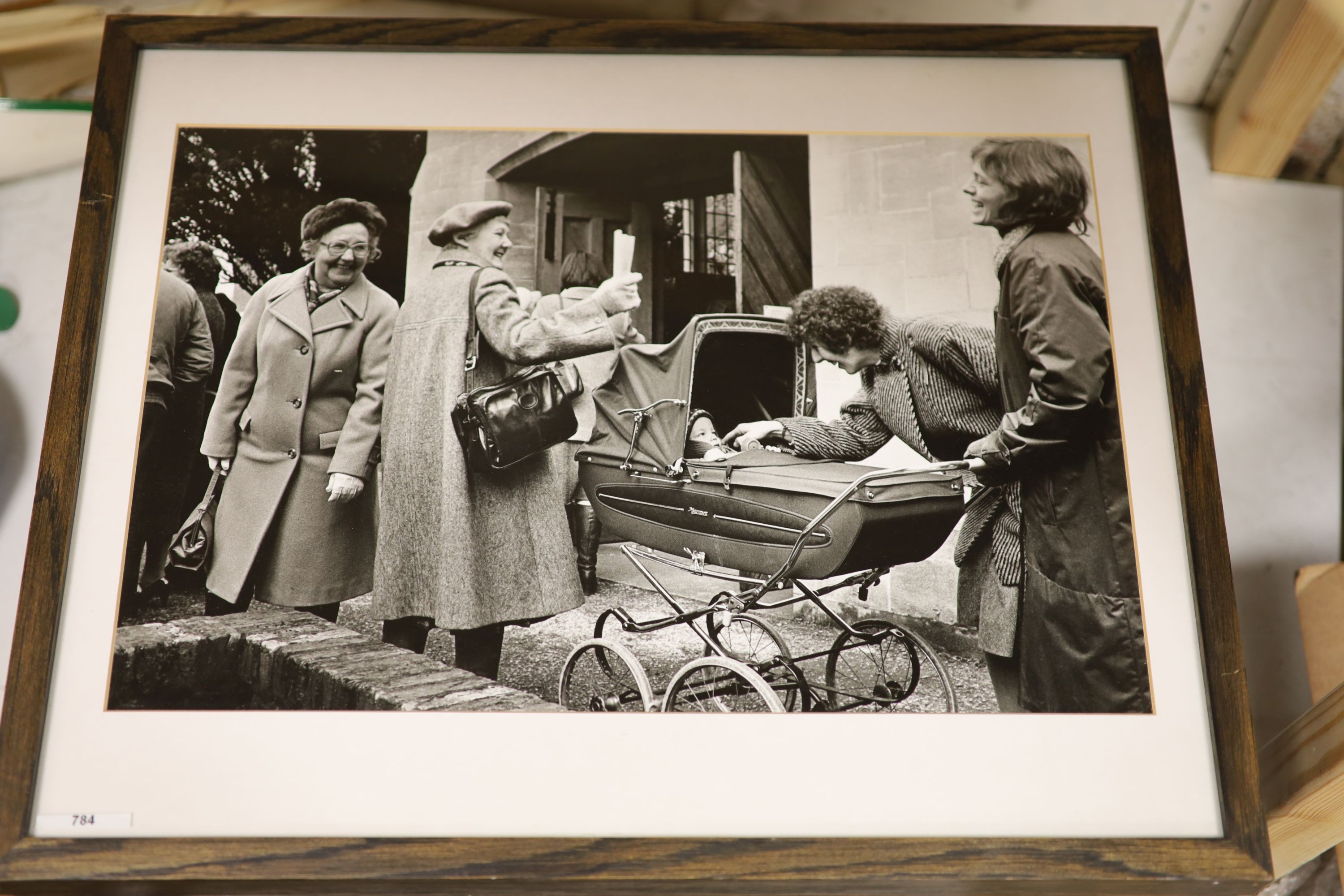 A collection of modern black and white photographs: Henk Jonker, Children and organ grinder, Roger Mayne, Please Mr Take My Photo, Unknown, The Village Hall, Christian Pizal